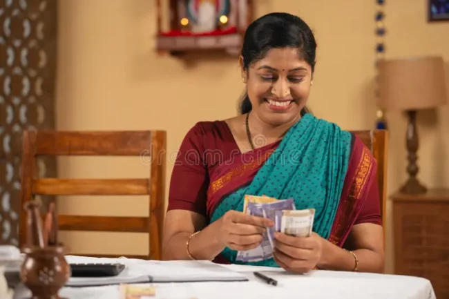 happy-smiling-middle-aged-woman-counting-money-currency-notes-home-concept-budgeting-responsible-spending-happy-smiling-296531525