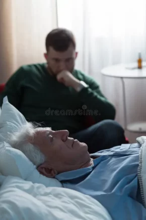ill-father-lying-hospital-bed-his-worried-son-52190307