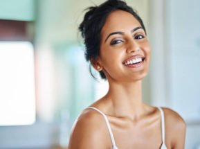 Portrait of an attractive young woman going through her morning routine
